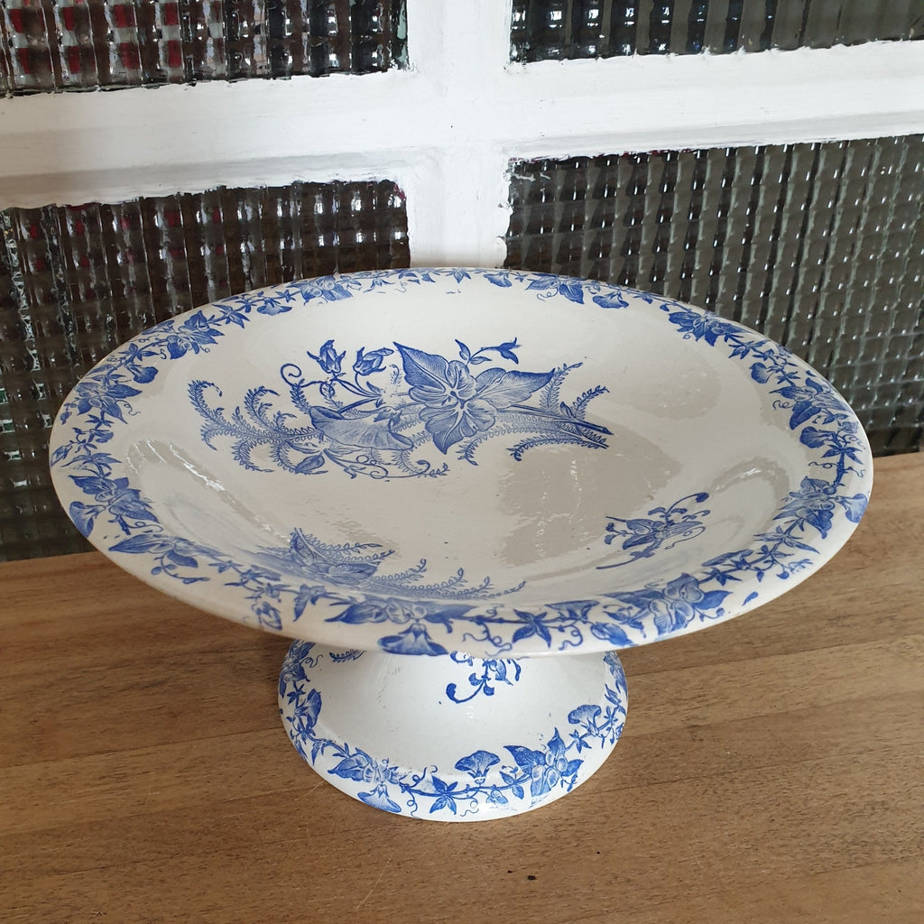 Compotier coupe à fruits sur piedouche Terre de Fer par Pexonne décor Liseron bleu éclat en-dessous par Hello Broc brocante en ligne