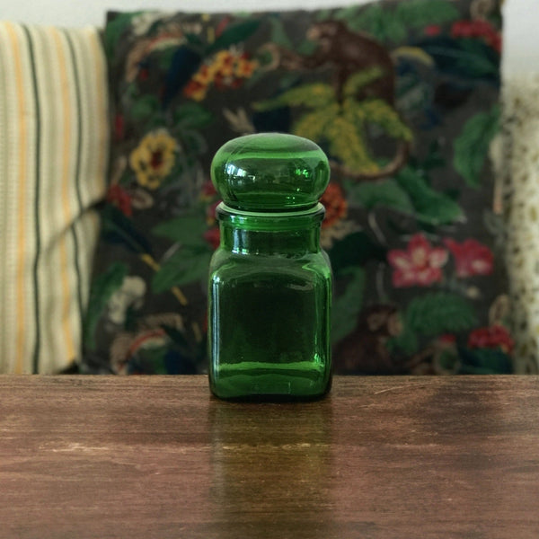 Petit bocal publicitaire Ariel en verre moulé vert années 60 par Hello Broc brocante en ligne