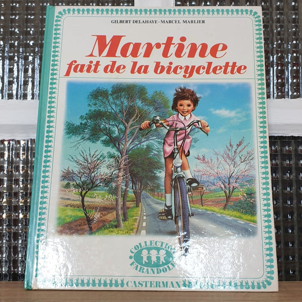 Livre illustré pour enfant Martine fait de la bicyclette 1974 - Hello Broc