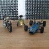 Trio de véhicules miniatures : voiture de course, moto et hélicoptère par Hello Broc brocante en ligne