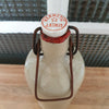 Bouteille vintage en grès vernissé écru par Hello Broc brocante en ligne