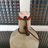 Bouteille vintage en grès vernissé écru par Hello Broc brocante en ligne
