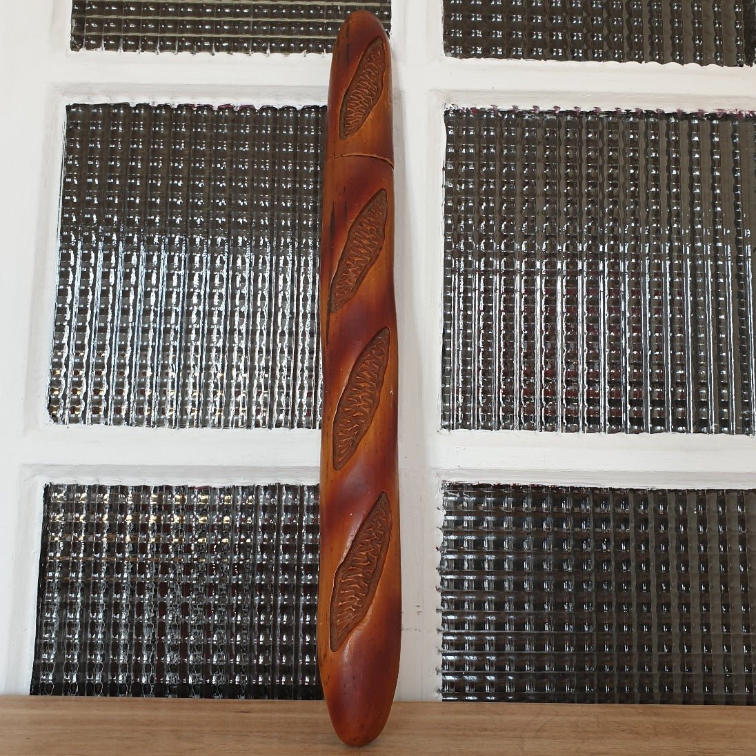 Wooden baguetteshaped bread knife by Cuzin Hello Broc