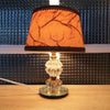 Lampe de chevet pied en cristal taillé et bronze, base miroir et abat-jour imitation parchemin - Hello Broc
