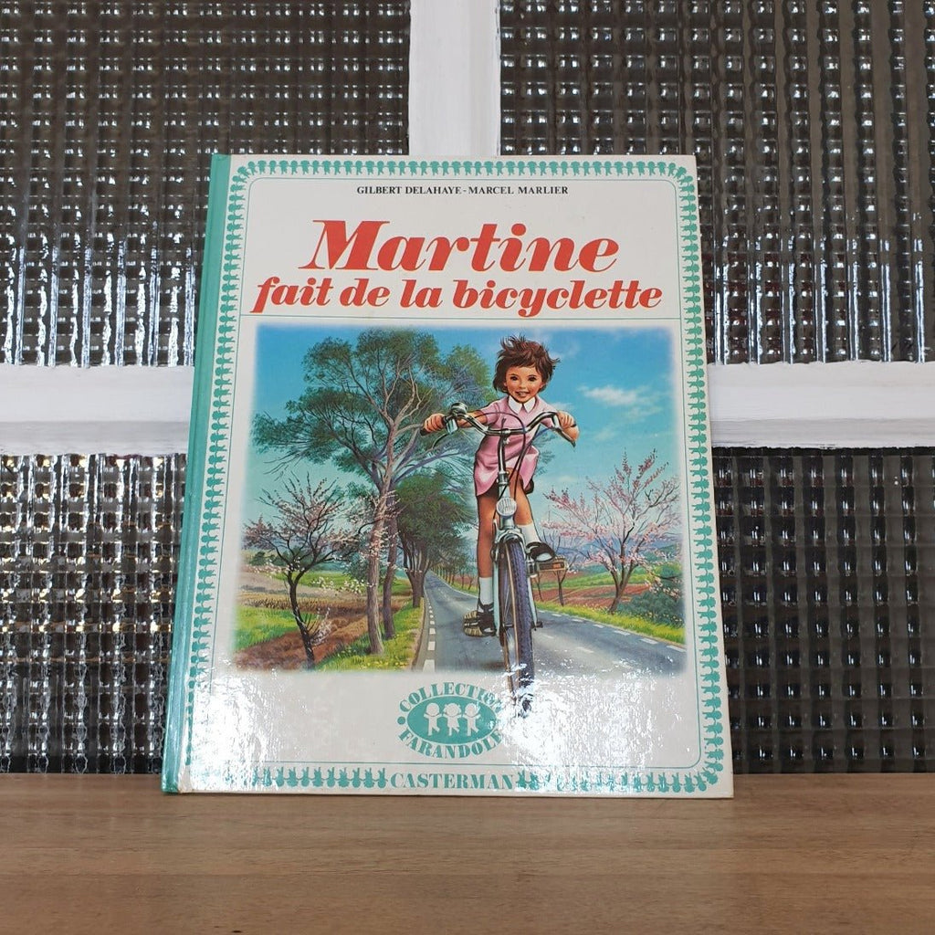 Livre illustré pour enfant Martine fait de la bicyclette 1974 - Hello Broc