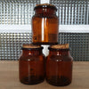Lot de 3 petits bocaux style pot apothicaire en verre moulé ambré avec bouchon d'origine en liège - Hello Broc
