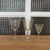 Lot de 4 verres à vin cuit sur pied de forme tulipe décor volutes et croix - 3 lots en stock - Hello Broc