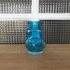 Petit bocal publicitaire pour Ariel en verre moulé bleu par Hello Broc brocante en ligne